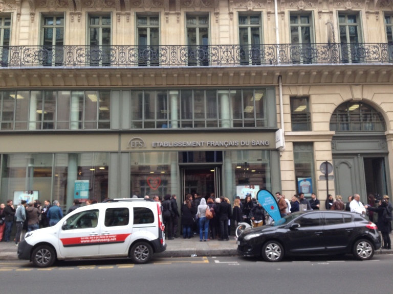 Parisians line up outside the Etablissement Français du Sang waiting to donate their blood on Rue de Châteaudun in the 9th arrondissement. 